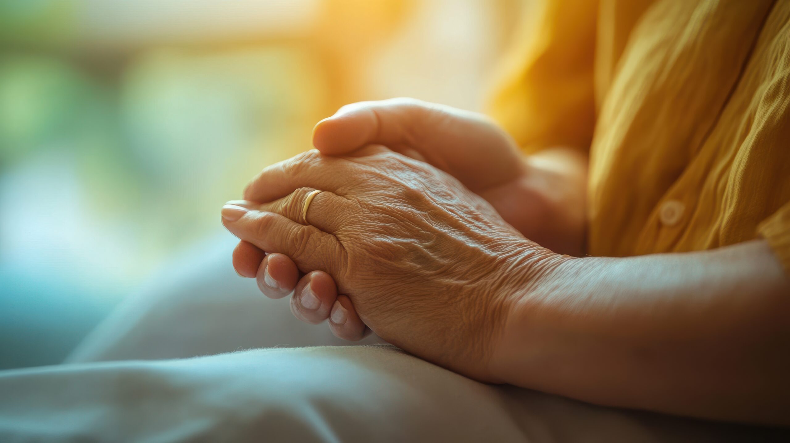 A serene closeup of a person39s hand resting on a caregiveras hand symbolizing care rest